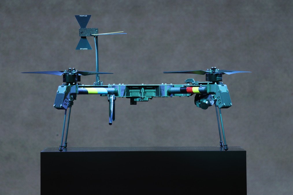 A “Linza” drone stands illuminated in blue light at the production facility of Quantum Frontline Industries prior to a visit by Ukrainian President Volodymyr Zelenskyy on February 13, 2026 near Munich, Germany. (Source: Getty Images)