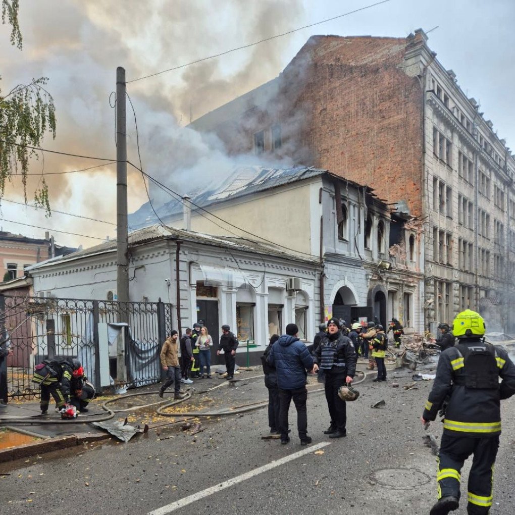 Smoke billows from the damaged kindergarten as firefighters and residents gather in the streets of Kharkiv after the morning drone attack. (Source: Ukrainian President Volodymyr Zelenskyy)
