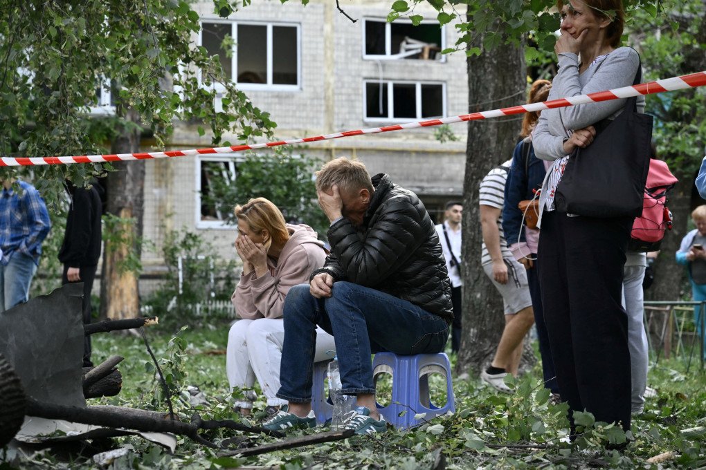 Residents react as Ukrainian rescuers conduct search and rescue work in a heavily damaged residential building following the Russian missile strike in Kyiv on June 17, 2025. (Source: Getty Images) Residents react as Ukrainian rescuers conduct search and rescue work in a heavily damaged residential building following the Russian missile strike in Kyiv on June 17, 2025. (Source: Getty Images)