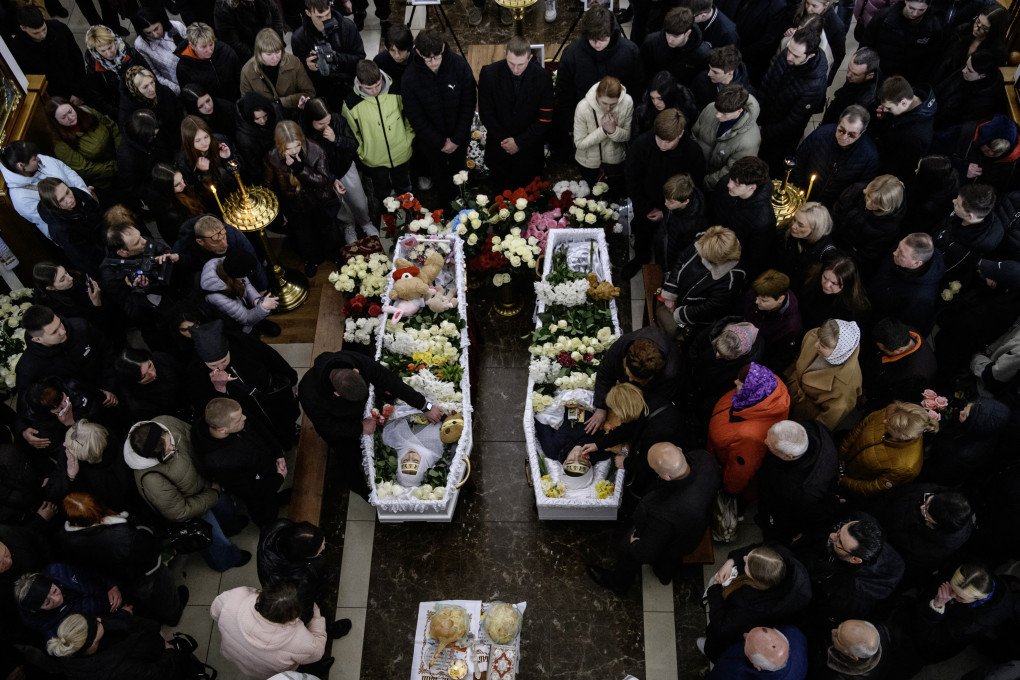 APRIL 7, 2025: Mourners gather at the funeral of two teenagers, Alina Kutsenko and Danylo Nikitskyi, both 15, at a church in Kryvyi Rih, Dnipropetrovsk region. (Photo: VLADYSLAV MUSIIENKO via Getty Images)