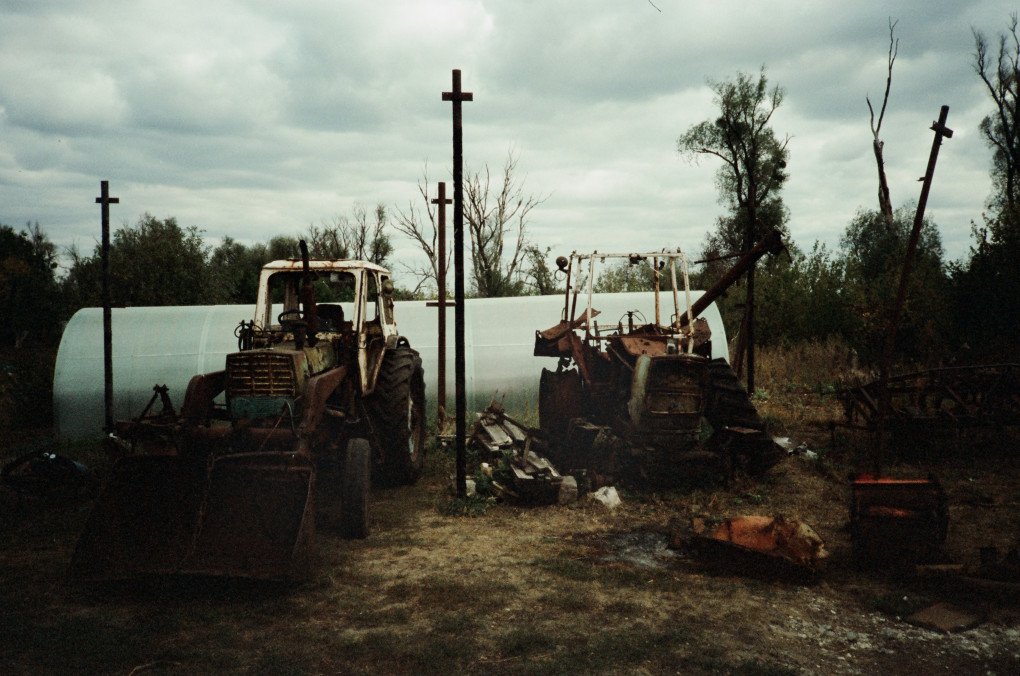 The Brothers tractors which were destroyed by the Russian occupiers. Dovhenke, Ukraine. October, 2025. Photo by Joshua Olley/UNITED24 Media.