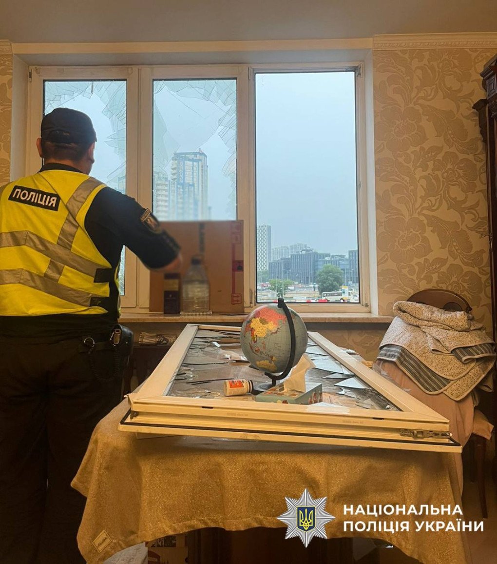 Policeman documents the aftermath of a Russian drone strike on a high-rise residential building in Kyiv, on July 28, 2025. (Source: National Police of Ukraine / Telegram) Policeman documents the aftermath of a Russian drone strike on a high-rise residential building in Kyiv, on July 28, 2025. (Source: National Police of Ukraine / Telegram)