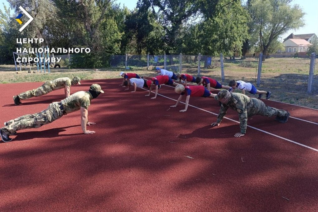 Russians force children in the occupied Luhansk to perform military exercises, August 2025. (Source: Ukraine’s National Resistance Center)