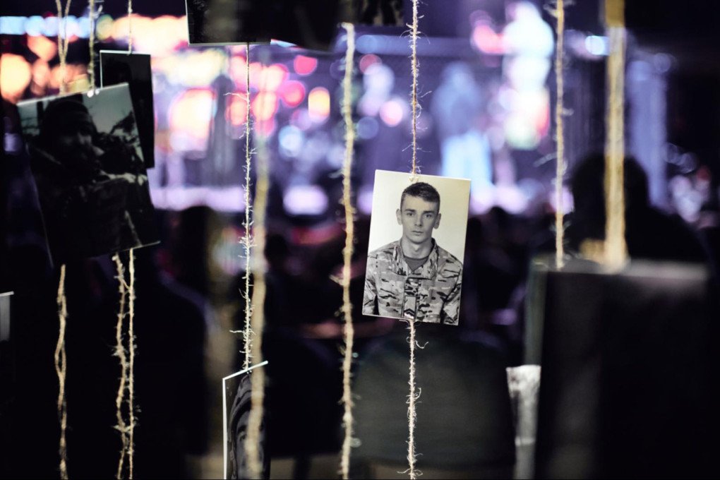 Photo installation honoring the fallen warriors displayed at the international MMA competition “IDU NA VY: Tryzna.” Kyiv, Ukraine, October 9, 2026. (Photo: Louis Beaudemont/UNITED24 Media)
