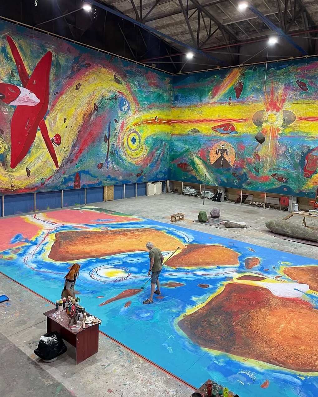 Ukrainian artist Petro Antyp works on The Creation of Culture, the seventh section of his monumental painting Cosmogony, at the Museum of Modern Ukrainian Art in Lutsk, Ukraine in 2023. (Source: @petroantyp/Instagram)