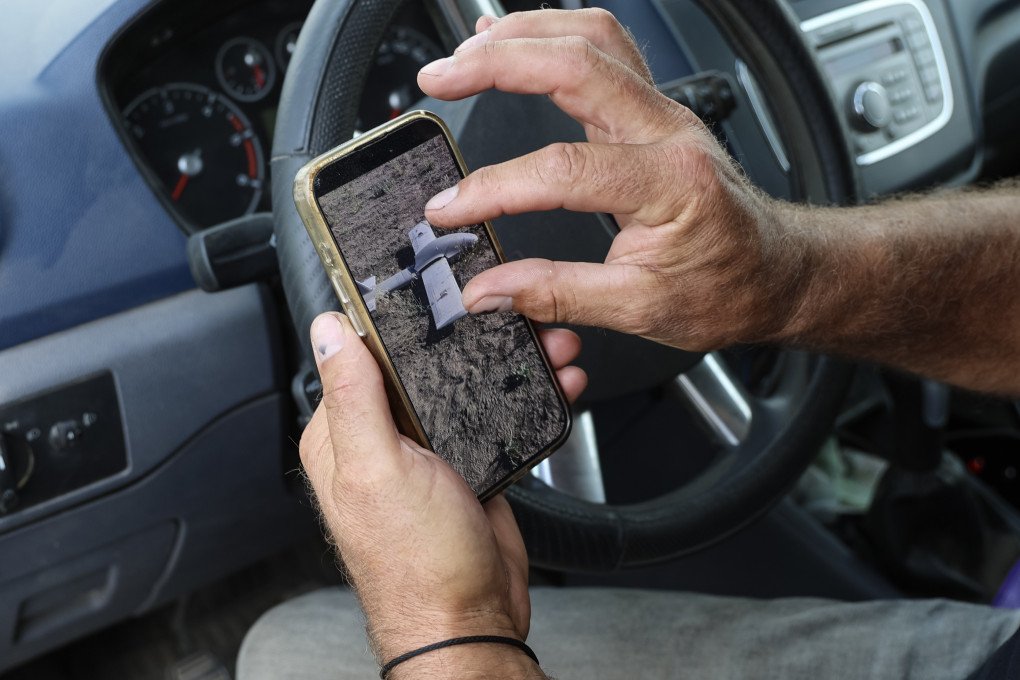 Ukrainian farmer Oleksandr Hordiienko shows on his smartphone the Russian drone “Molniya-2” (one of the modifications of the strike drone that the Russian military improve and update), which Ukrainian farmers landed with electronic warfare on Oleksandr’s farm field on July 29, 2025 in Kherson region, Ukraine. (Photo by Ivan Antypenko via Getty Images) Ukrainian farmer Oleksandr Hordiienko shows on his smartphone the Russian drone “Molniya-2” (one of the modifications of the strike drone that the Russian military improve and update), which Ukrainian farmers landed with electronic warfare on Oleksandr’s farm field on July 29, 2025 in Kherson region, Ukraine. (Photo by Ivan Antypenko via Getty Images)