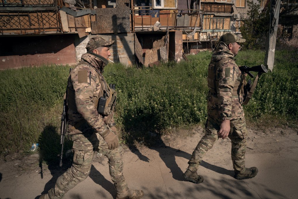 Eugene and Serhii patrol in the kill zone of Kherson, 500 meters from the Dnipro River and 1.5 kilometers from Russian positions. Kherson, Ukraine, May 2026. Photo: Joshua Olley / UNITED24 Media.
