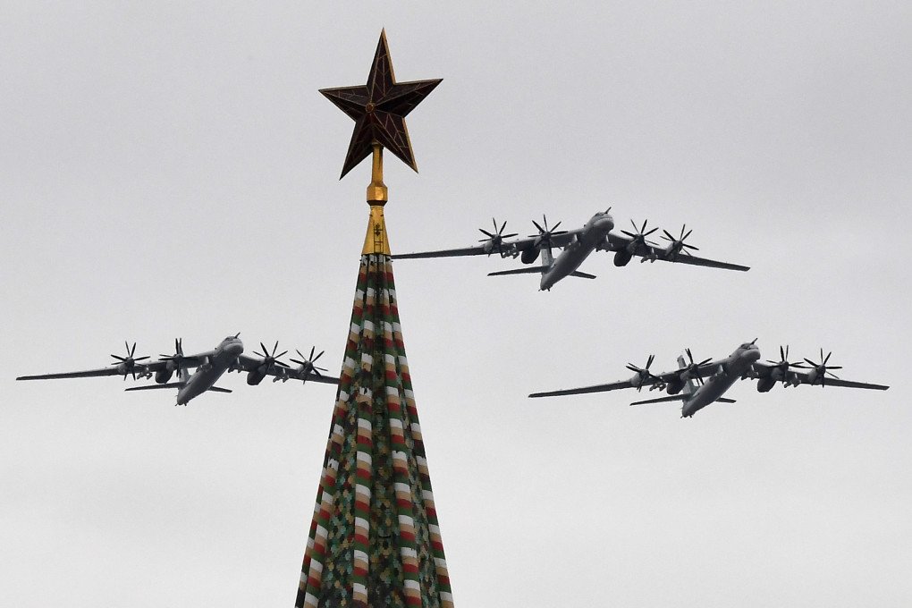 Russian Tupolev Tu-95MS strategic bombers fly over the Kremlin and Red Square in downtown Moscow on May 9, 2020. (Source: Getty Images) Russian Tupolev Tu-95MS strategic bombers fly over the Kremlin and Red Square in downtown Moscow on May 9, 2020. (Source: Getty Images)