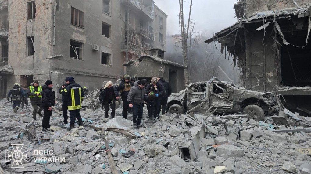 Emergency workers evacuate civilians and search for survivors among the ruins of a damaged apartment block in Kharkiv after the attack. (Source: State Emergency Service)