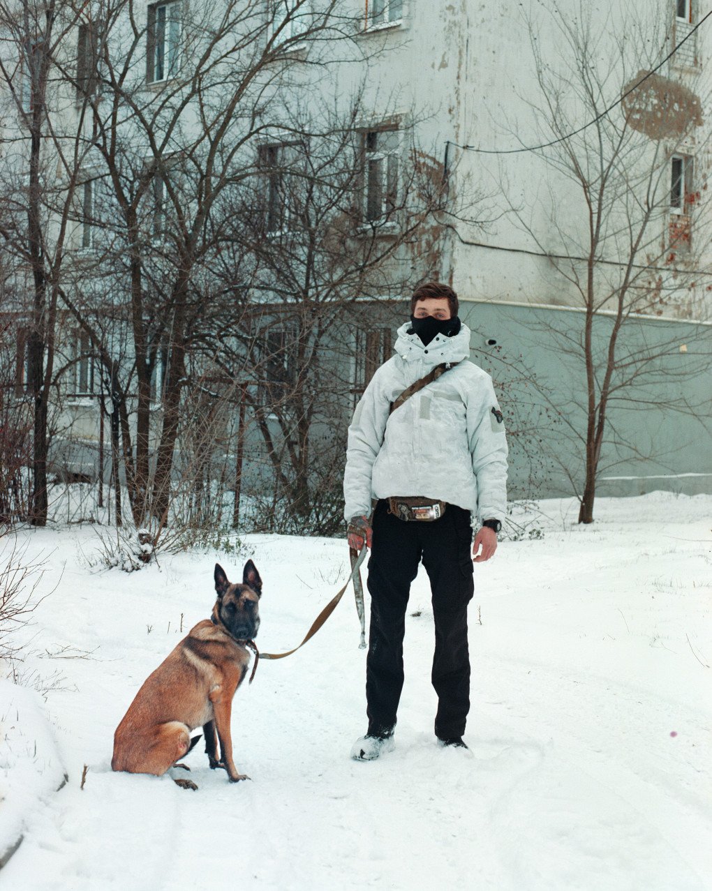 Jag, 25, stands with his dog, Runa. December 24, 2025. Izium region. Photo by Joshua Olley/UNITED24 Media. Jag, 25, stands with his dog, Runa. December 24, 2025. Izium region. Photo by Joshua Olley/UNITED24 Media.