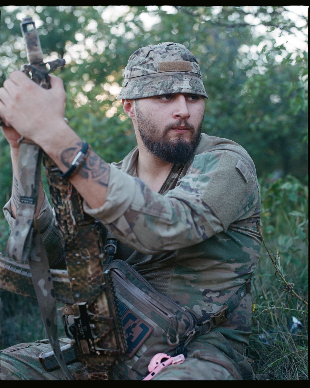 Xerox waits with the guys from his brigade before being taken to positions. Ukraine, August 2025. Photo by Lucile Brizard/UNITED24 Media.