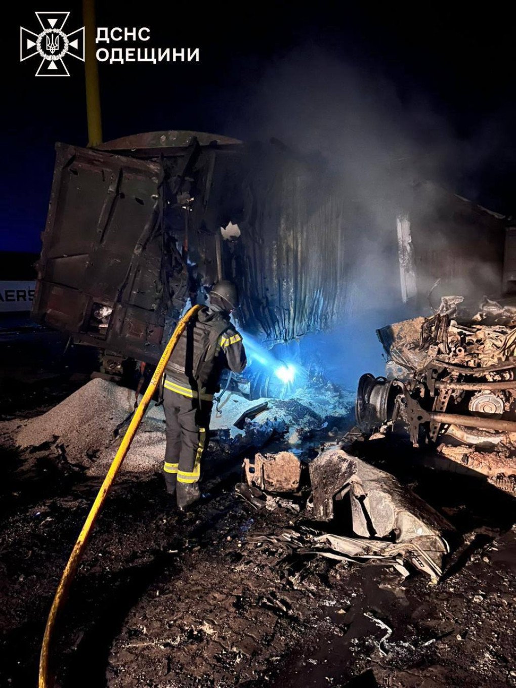 Firefighters extinguish a burning truck at an Odesa port facility following a Russian missile strike on December 20. (Source: State Emergency Service) Firefighters extinguish a burning truck at an Odesa port facility following a Russian missile strike on December 20. (Source: State Emergency Service)