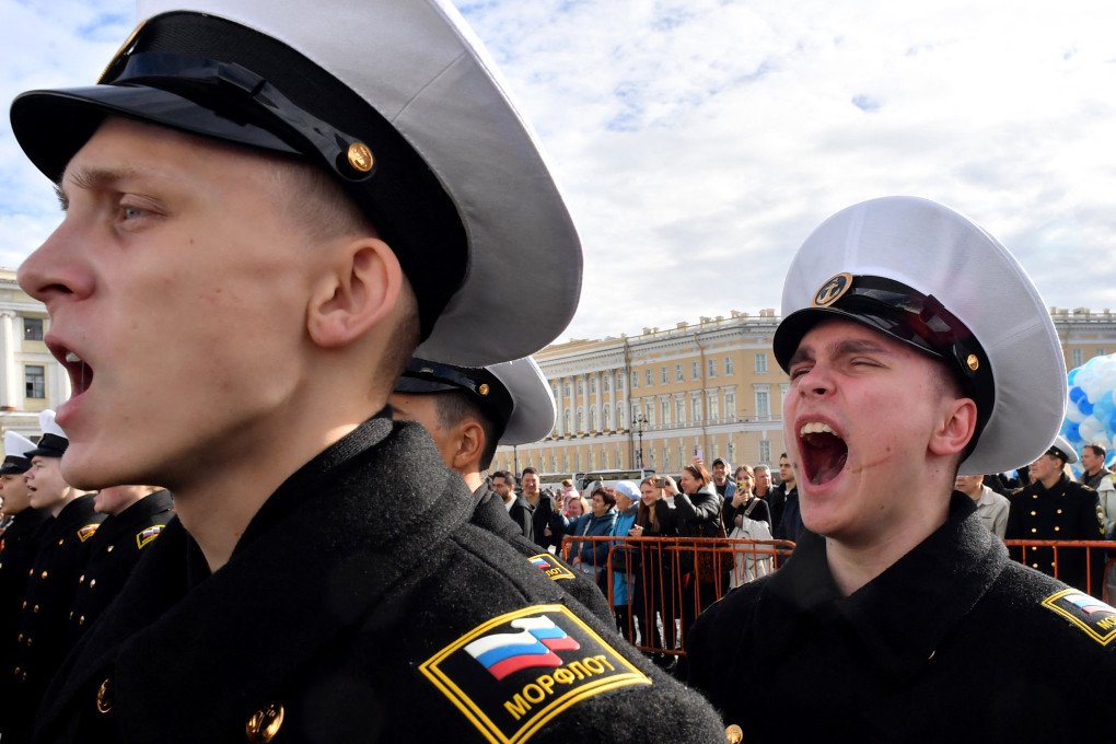 Cadets of the Admiral Makarov State University of sea and river fleet take part in the cadet initiation ceremony in Saint Petersburg on September 27, 2025. Photo by OLGA MALTSEVA/AFP via Getty Images.