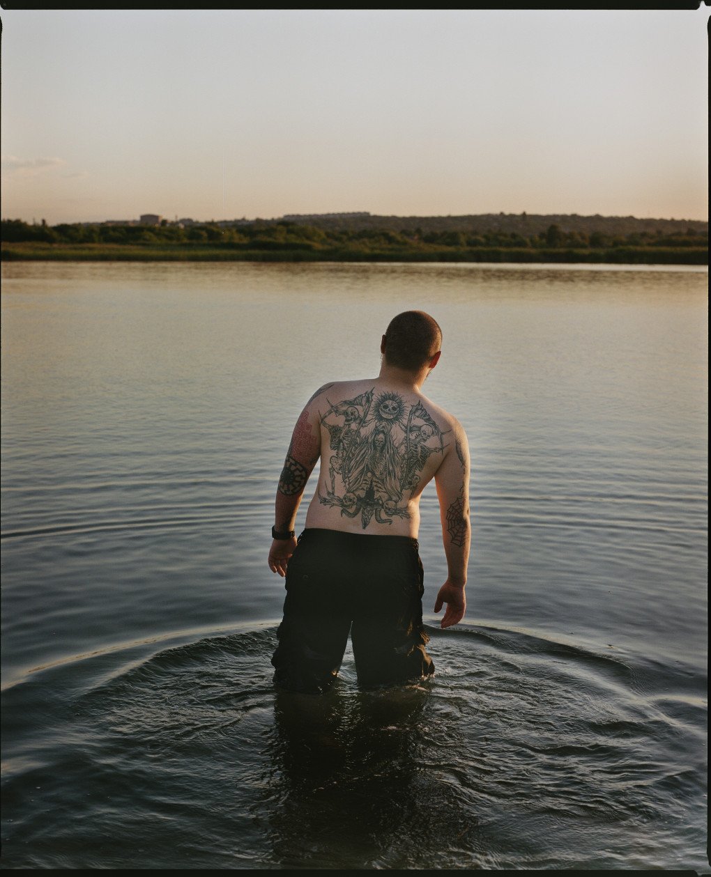 A Ukrainian soldier swims in a lake locally known as “Cuba,” near Sloviansk, Ukraine. July 2026. (Photo: Joshua Olley / UNITED24 Media) A Ukrainian soldier swims in a lake locally known as “Cuba,” near Sloviansk, Ukraine. July 2026. (Photo: Joshua Olley / UNITED24 Media)