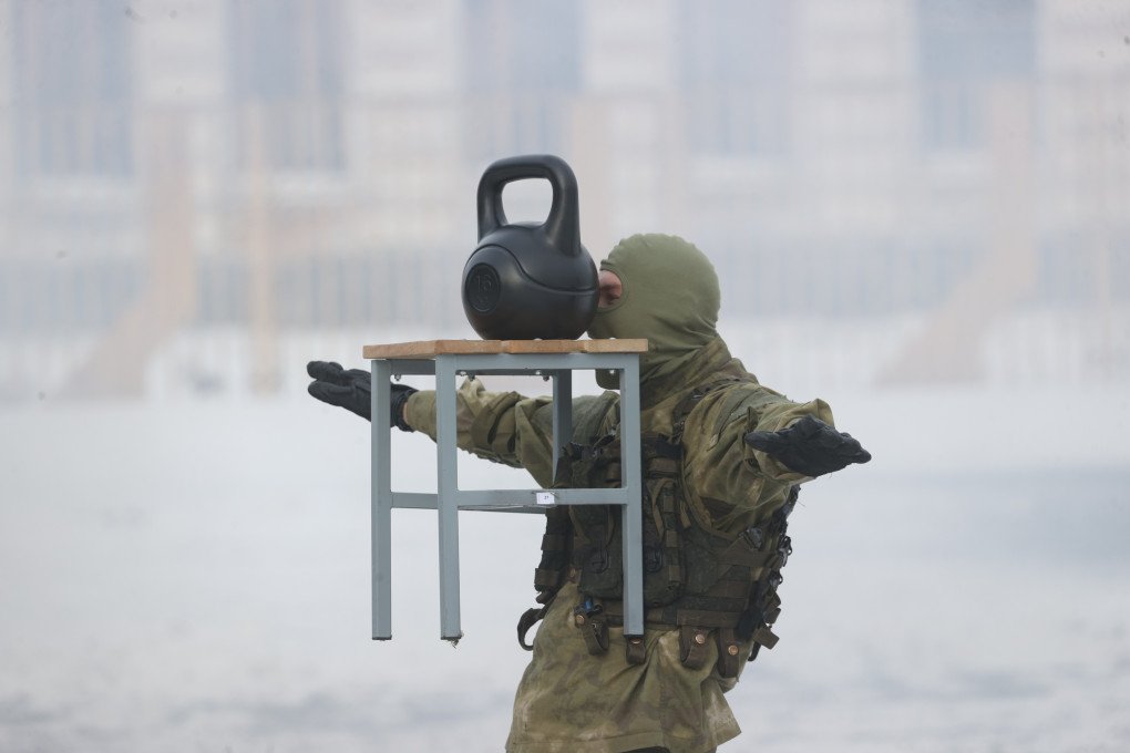 Soldiers demonstrate their skills as they perform during the 60th anniversary celebrations of The 5th Special Forces Brigade, at the city of Maryina Gorka in Minsk, Belarus, on December 27, 2022. (Source: Getty Images)