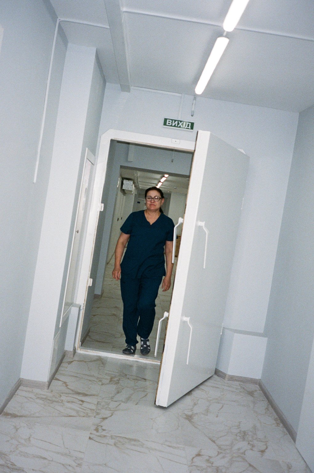 A nurse walks through the maternity ward’s blast-resistant doors, built to withstand Russian strikes. (Source: UNITED24 Media/Joshua Olley) A nurse walks through the maternity ward’s blast-resistant doors, built to withstand Russian strikes. (Source: UNITED24 Media/Joshua Olley)