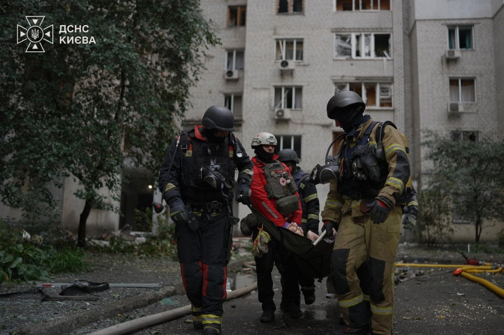 Emergency responders evacuate a person from a residential building damaged in a Russian drone attack on September 25, 2026. (Source: SES) Emergency responders evacuate a person from a residential building damaged in a Russian drone attack on September 25, 2026. (Source: SES)