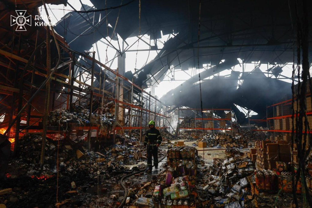 A firefighter walks through the wreckage inside a destroyed warehouse building filled with debris and collapsed roofing material. (Source: State Emergency Service of Ukraine) A firefighter walks through the wreckage inside a destroyed warehouse building filled with debris and collapsed roofing material. (Source: State Emergency Service of Ukraine)