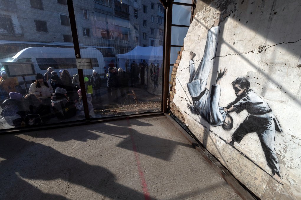 The Boy Who Defeats an Adult Judoka graffiti by British artist Banksy is pictured in Borodianka, Kyiv region. (Source: Getty Images) The Boy Who Defeats an Adult Judoka graffiti by British artist Banksy is pictured in Borodianka, Kyiv region. (Source: Getty Images)