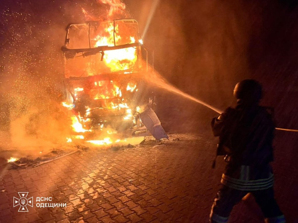 Firefighters extinguish a burning vehicle following a Russian attack on Ukraine’s Odesa region. (Source: State Emergency Service)