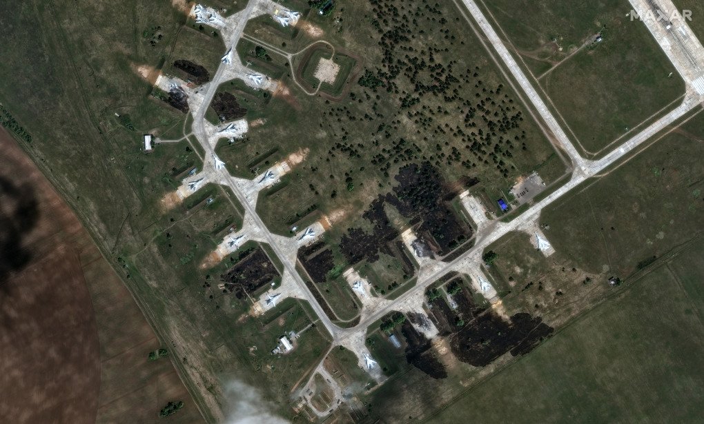 Imagery reveals significant destruction to Tu-22 bombers following a drone strike on Belaya Airbase. (Image: Satellite Maxar Technologies)