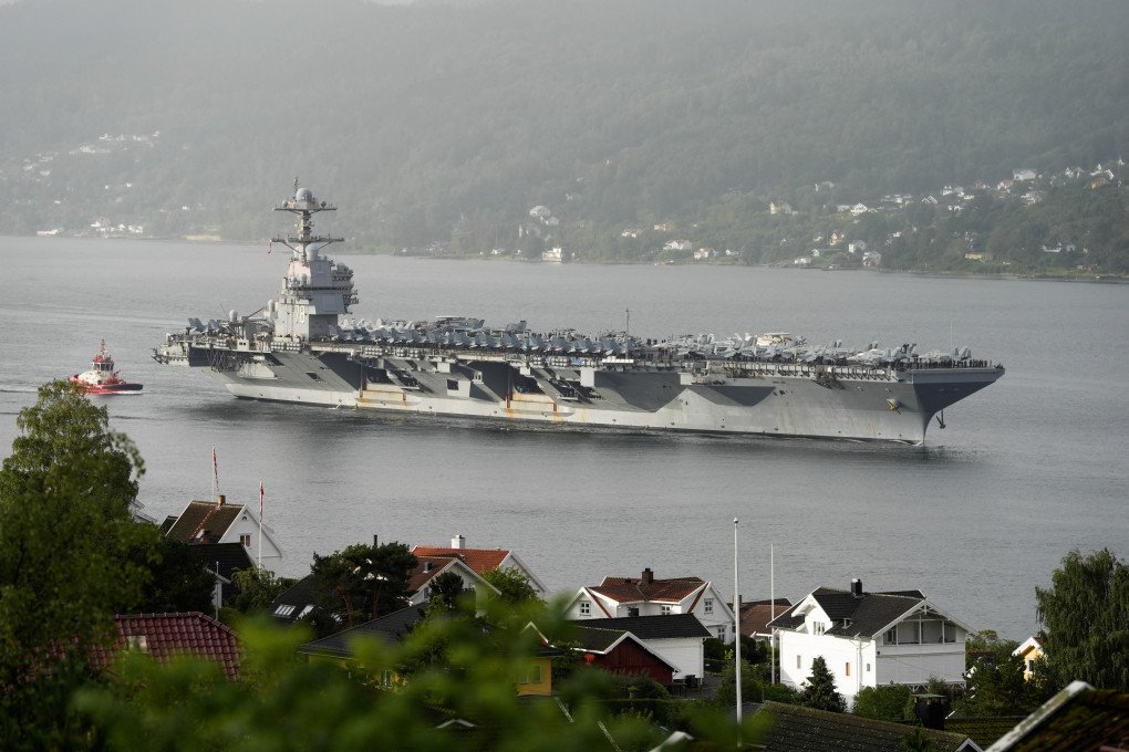 The US aircraft carrier USS Gerald R. Ford is on its way into the Oslofjord, here at Drøbak and Oscarsborg, on September 12, 2025. (Source: Getty Images)