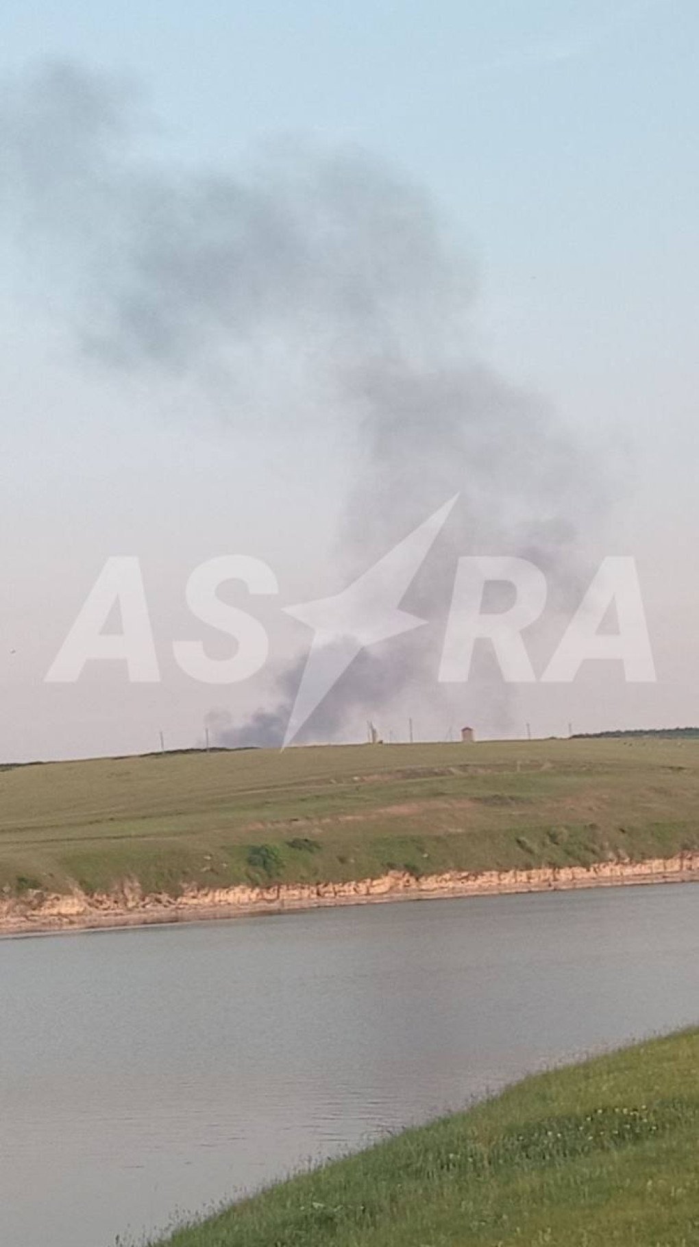 Smoke rising at the crash site of a Russian strategic bomber in the Irkutsk region, June 15, 2026. (Source: Astra) Smoke rising at the crash site of a Russian strategic bomber in the Irkutsk region, June 15, 2026.