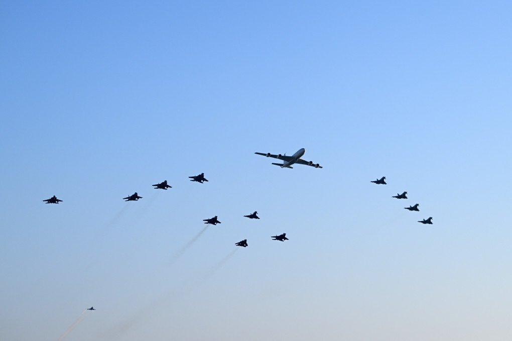 A Boeing KC-707, six Eurofighter Typhoons, six F-15SA Strike Eagles, and a single Panavia Tornado IDS of the Royal Saudi Air Force fly over during practice ahead of the F1 Grand Prix of Saudi Arabia at Jeddah Corniche Circuit on April 18, 2025.