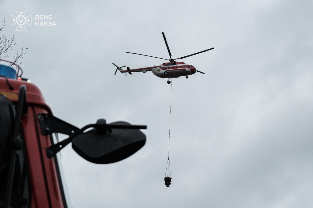 A firefighting helicopter operates over Kyiv following a Russian missile strike on October 25, 2025. (Source: DSNS Kyiv)
