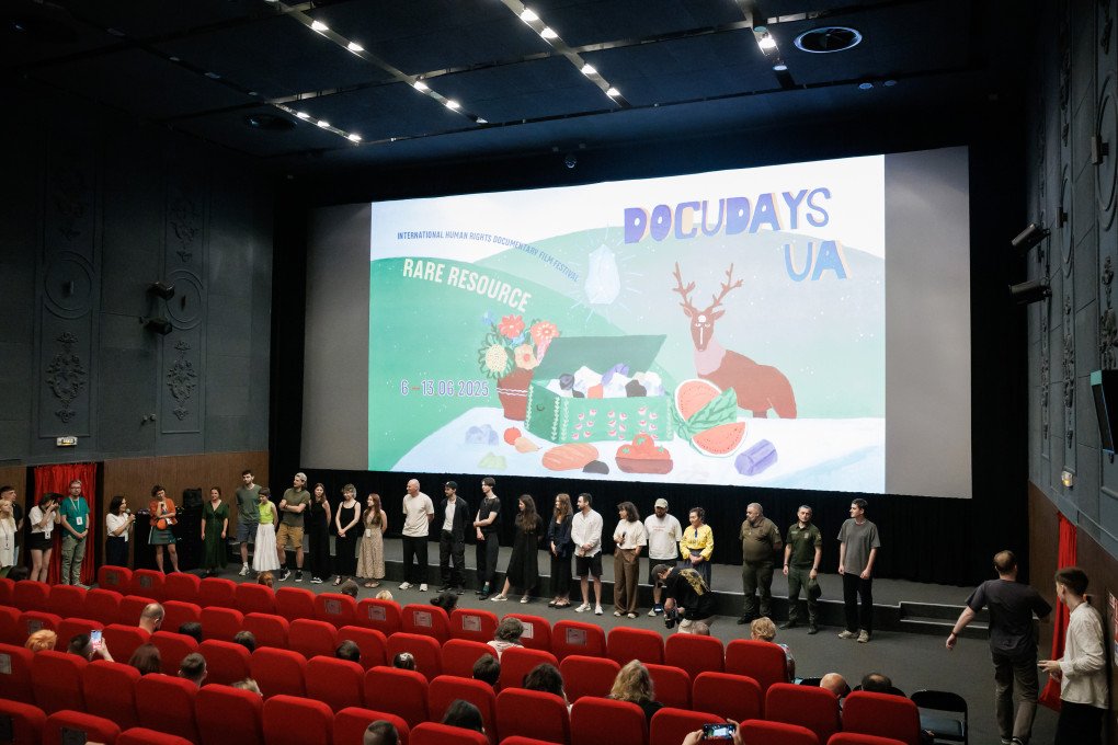 The directors of the movie Militantropos, Yelizaveta Smith, Alina Gorlova, and Simon Mozghovyi, stand in front of the audience after the end of the screening. The directors of the movie Militantropos, Yelizaveta Smith, Alina Gorlova, and Simon Mozghovyi, stand in front of the audience after the end of the screening.