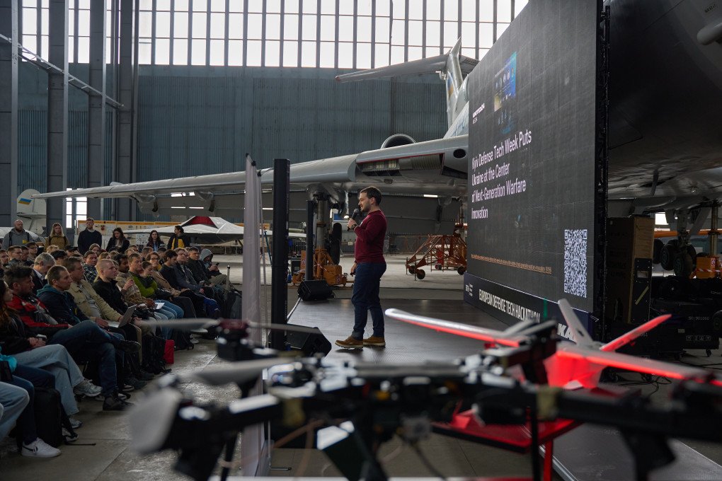 Benjamin Wolba, co-founder of the European Defense Tech Hub (EDTH), speaks during the opening ceremony of the Kyiv Defense Tech Week Hackathon, May 1, 2026. (Source: KDTW)