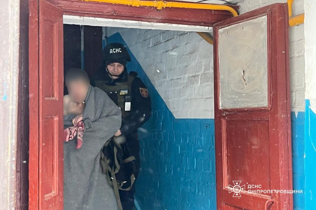 A woman is evacuated from a damaged residential building by Ukraine’s State Emergency Service following Russian shelling of the city on January 16, 2026. (Photo: State Emergency Service)