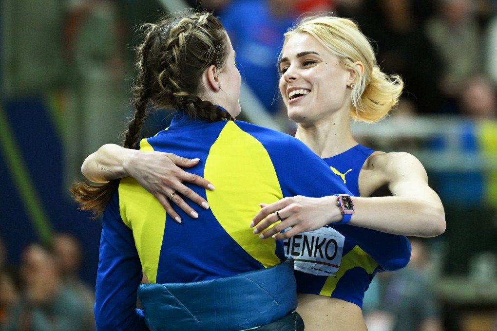 Yaroslava Mahuchikh and Yuliia Levchenko react during the women’s high jump final at the World Athletics Indoor Championships in Toruń on March 20, 2026. (Source: Getty Images)