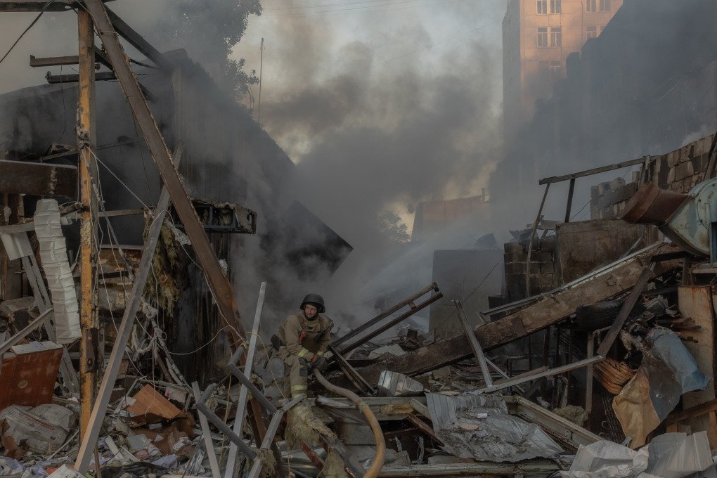 A firefighter works at the site next to a multi storey residential building damaged following massive Russian missile and drone strikes to Kyiv on June 2, 2026, amid Russian invasion in Ukraine. (Photo by Roman PILIPEY / AFP via Getty Images) Russian mass attack