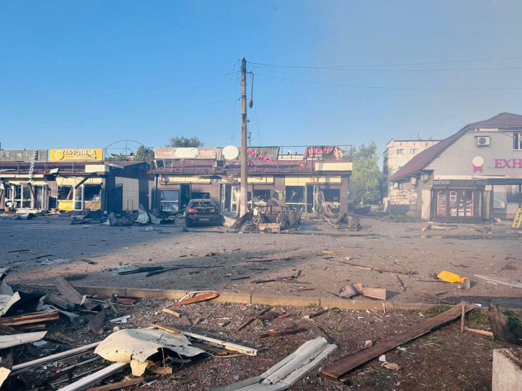 Debris strewn across the forecourt of a central Dobropillia shopping center after a 500-kg Russian airstrike on July 16, 2025, with damaged storefronts and vehicles in the background. (Source: Vadym Filashkin/Telegram). Debris strewn across the forecourt of a central Dobropillia shopping center after a 500-kg Russian airstrike on July 16, 2025, with damaged storefronts and vehicles in the background. (Source: Vadym Filashkin/Telegram).