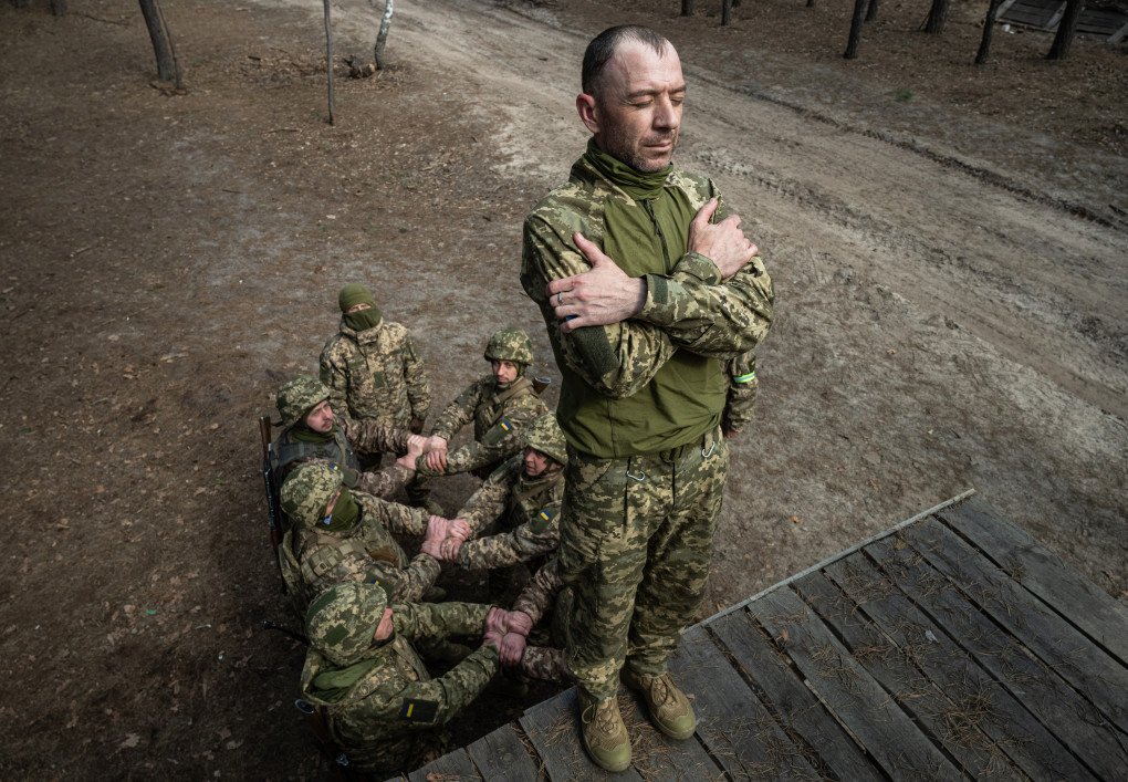 Recruits perform a trust fall as part of psychological training while undergoing basic military training at a training centre of the Ukrainian Land Forces, March 25, 2026. (Photo by Danylo Antoniuk via Getty Images) Recruits perform a trust fall as part of psychological training while undergoing basic military training at a training centre of the Ukrainian Land Forces, March 25, 2026. (Photo by Danylo Antoniuk via Getty Images)