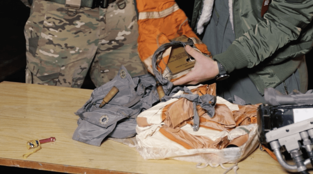 Bright orange life raft from the survival kit, designed to keep pilots safe and visible during water landings. (Source: ArmyTV) Bright orange life raft from the survival kit, designed to keep pilots safe and visible during water landings. (Source: ArmyTV)