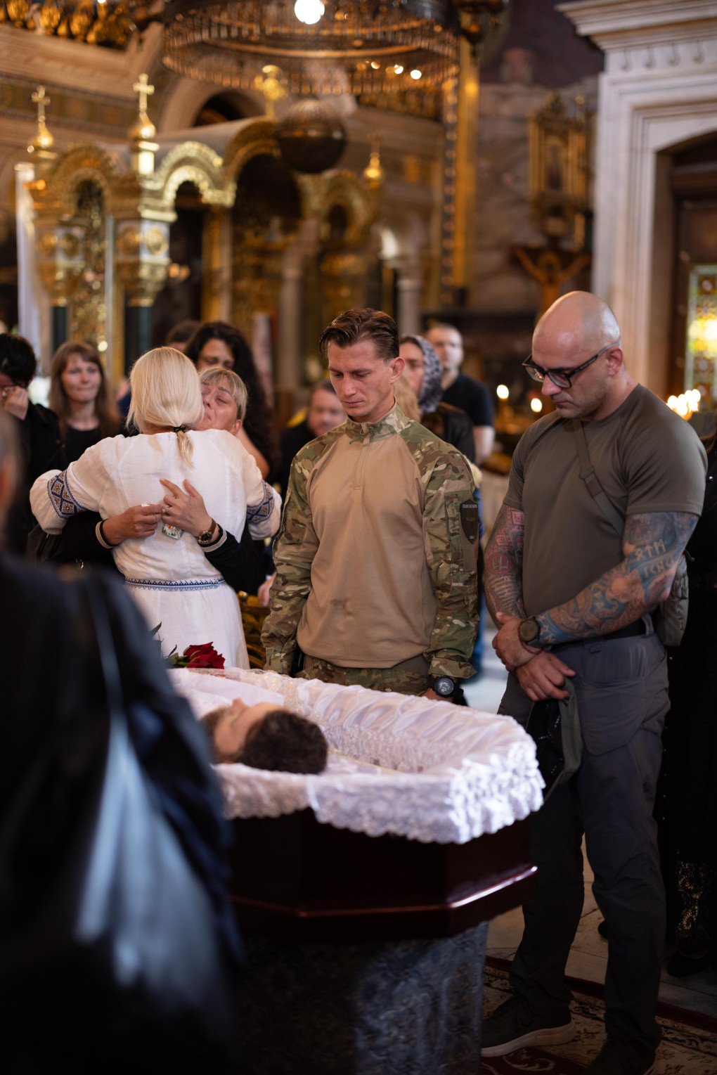 Family and friends at Oleksii Yukov’s funeral service at St. Volodymyr’s Cathedral in the center of Kyiv, August 8, 2026. Photo by Vic Bakin Family and friends at Oleksii Yukov’s funeral service at St. Volodymyr's Cathedral in the center of Kyiv, August 8, 2026. Photo by Vic Bakin