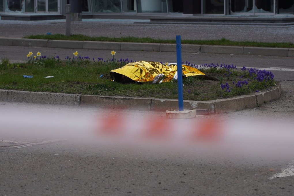 The body of a killed civilian lies after a Russian strike in Kyiv on April 16, 2026. (Source: Getty Images)