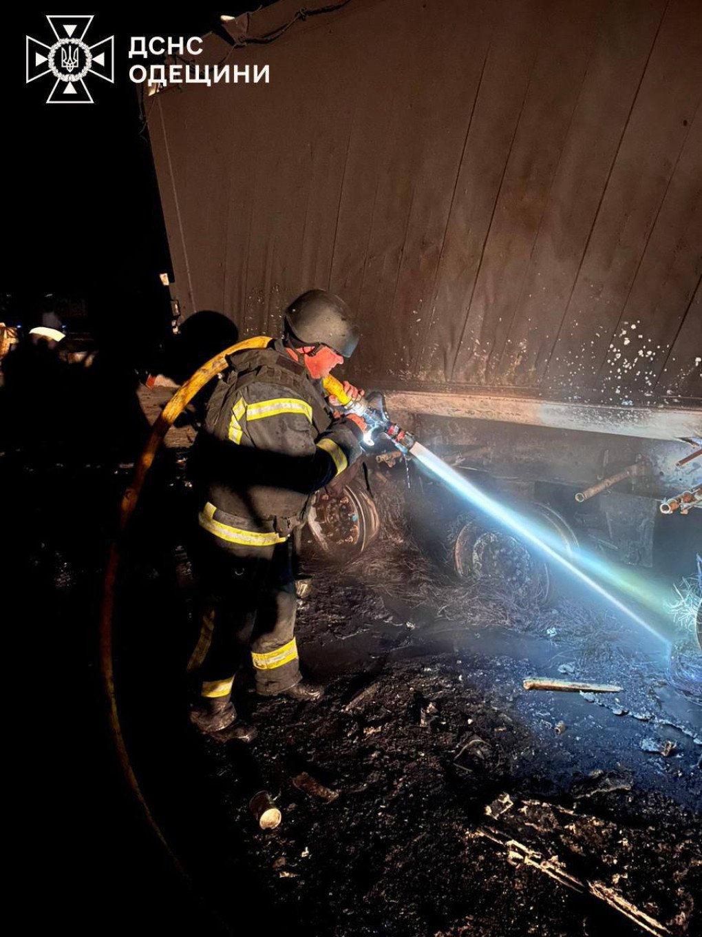 A firefighter works to extinguish flames engulfing a heavy truck destroyed in the strike on Odesa. (Source: State Emergency Service) A firefighter works to extinguish flames engulfing a heavy truck destroyed in the strike on Odesa. (Source: State Emergency Service)