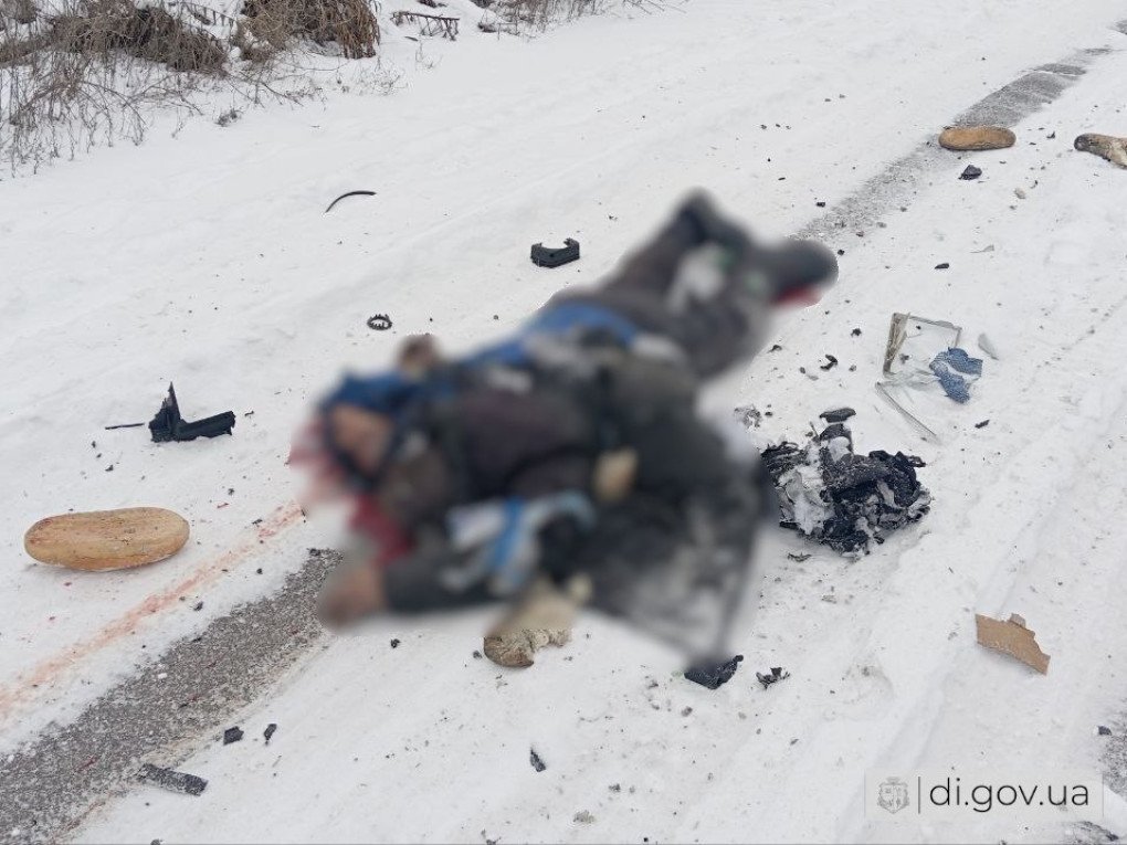 A body lying near the wreckage of a vehicle, with scattered debris and damage visible in the snow, following the Russian attck. (Photo: Vyacheslav Zadorenko) A body lying near the wreckage of a vehicle, with scattered debris and damage visible in the snow, following the Russian attck. (Photo: Vyacheslav Zadorenko)