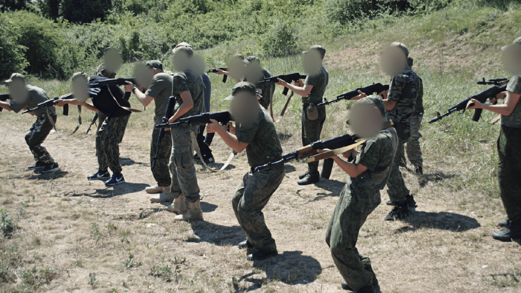 Still from the documentary film “Children. How Russia Teaches to Fight.“ (Source: Ukraine War Archive) Still from the documentary film “Children. How Russia Teaches to Fight.“ (Source: Ukraine War Archive)