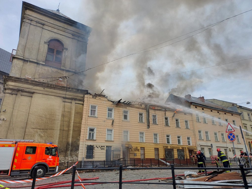 Firefighters extinguish a fire on building in center of city after Russian drone attack on March 24, 2026 in Lviv, Ukraine. (Source: Getty Images)