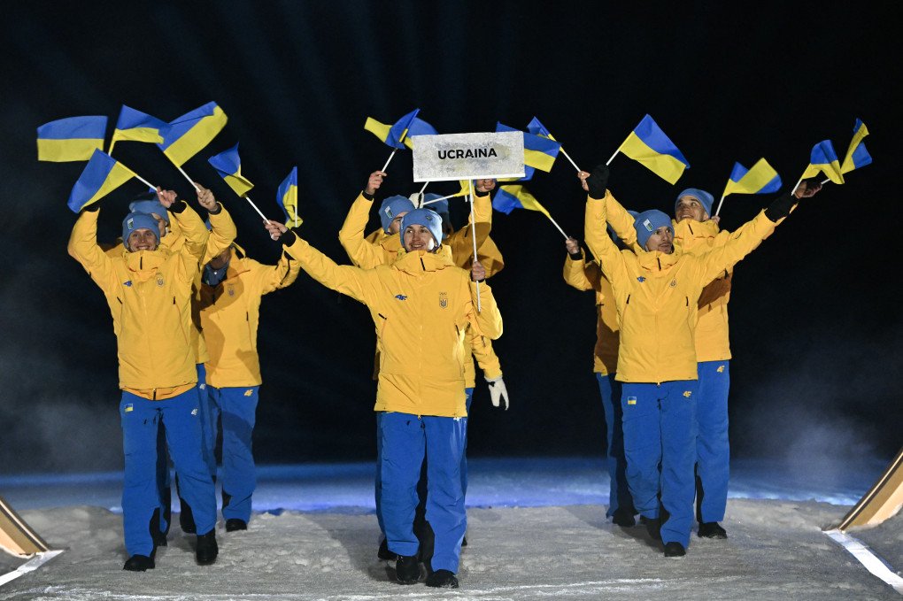Team Ukraine athletes parade during the opening ceremony of the Milano Cortina 2026 Winter Olympic Games at the Predazzo Ski Jumping Stadium in Predazzo on February 6, 2026. (Source: Getty Images)