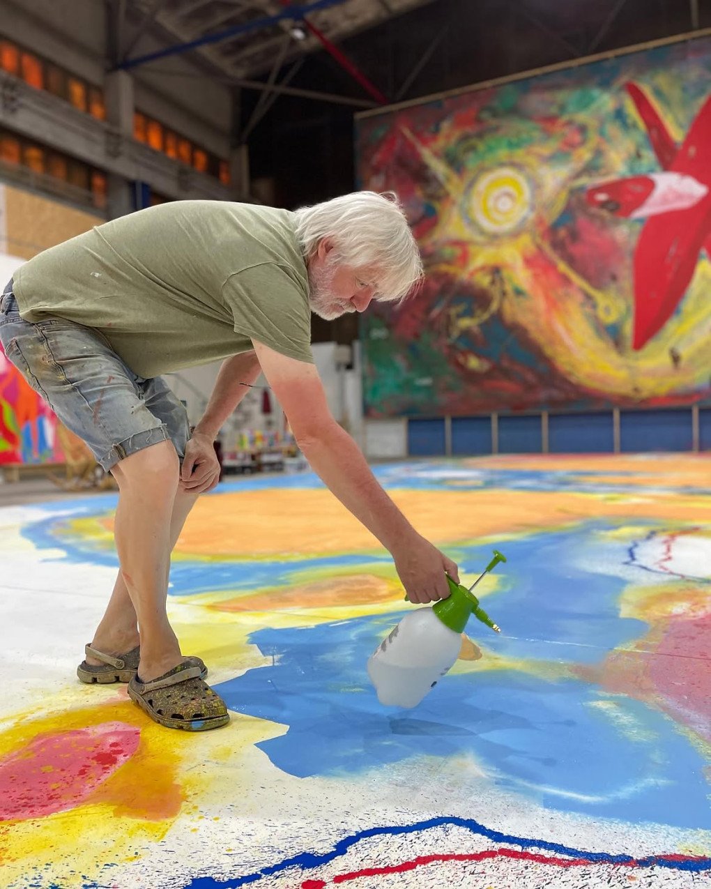 Ukrainian artist Petro Antyp works on The Creation of Culture, the seventh section of his monumental painting Cosmogony, at the Museum of Modern Ukrainian Art in Lutsk, Ukraine in 2023. (Source: @petroantyp/Instagram)