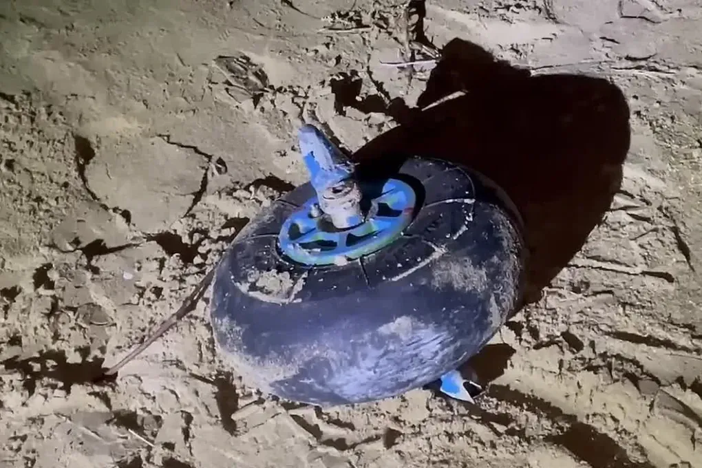 A detached wheel from the crashed Ka-226 helicopter found at the scene in Dagestan. The component was discovered several meters from the main wreckage. (Source: Russian media)