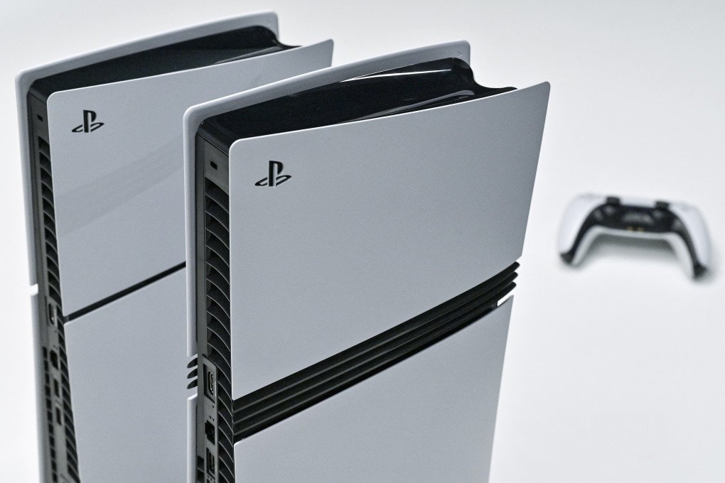 This photo illustration shows a Sony PlayStation 5 (L) and 5 Pro (C) on display at the Sony headquarters building in central Tokyo on November 27, 2024. (Source: Getty Images) This photo illustration shows a Sony PlayStation 5 (L) and 5 Pro (C) on display at the Sony headquarters building in central Tokyo on November 27, 2024.