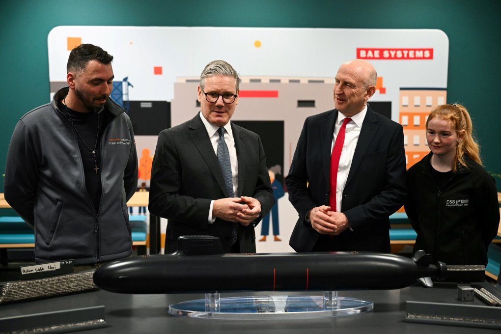 UK Prime Minister Keir Starmer (2nd L) and UK Defence Secretary John Healey (2nd R) meet with BAE system apprentices as they look at a submarine model during a joint visit on March 20, 2025 in Barrow-in-Furness, United Kingdom. The UK's existing nuclear deterrent program, or continuous at sea deterrent (CASD), is comprised of four Trident missile Vanguard Class Submarines, which are set to be replaced with four new Dreadnought Class submarines. (Photo: Oli Scarff - WPA Pool/Getty Images) UK Prime Minister Keir Starmer (2nd L) and UK Defence Secretary John Healey (2nd R) meet with BAE system apprentices as they look at a submarine model during a joint visit on March 20, 2025 in Barrow-in-Furness, United Kingdom. The UK's existing nuclear deterrent program, or continuous at sea deterrent (CASD), is comprised of four Trident missile Vanguard Class Submarines, which are set to be replaced with four new Dreadnought Class submarines. (Photo: Oli Scarff - WPA Pool/Getty Images)