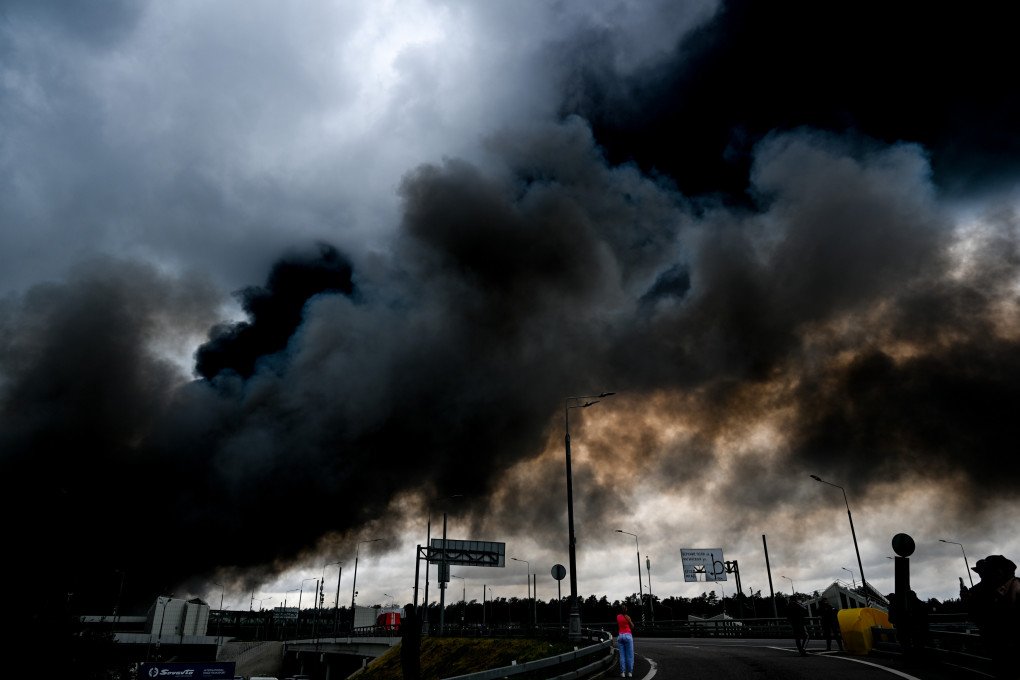 Black smoke rises from the refinery where a fire broke out following a Ukrainian strike as firefighting efforts continue in Moscow, Russia on June 18, 2026. (Photo by Sefa Karacan via Getty Images)