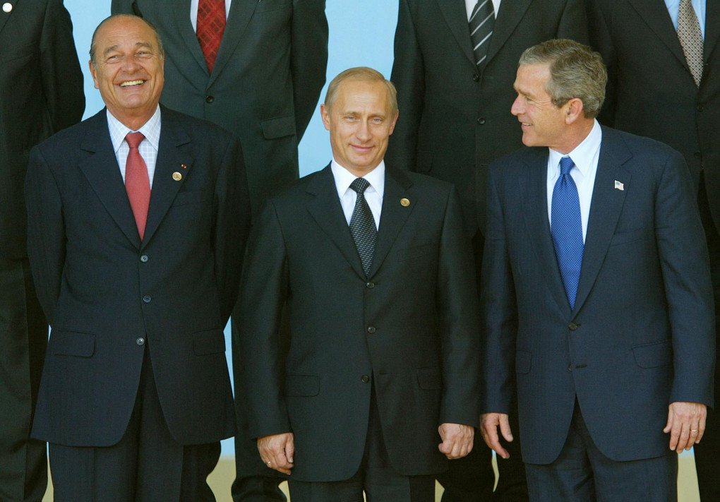 From left to right, French President Jacques Chirac, Russian leader Vladimir Putin, and U.S. President George W. Bush pose for a family photo during the NATO–Russia Summit in Rome on May 28, 2002, where Russia and NATO leaders signed the Rome Declaration establishing new relations. (Source: Getty Images) From left to right, French President Jacques Chirac, Russian leader Vladimir Putin, and U.S. President George W. Bush pose for a family photo during the NATO–Russia Summit in Rome on May 28, 2002, where Russia and NATO leaders signed the Rome Declaration establishing new relations. (Source: Getty Images)